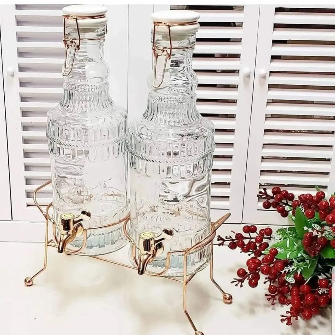 Double distributeur de boissons en verre, avec robinet sur un support en métal