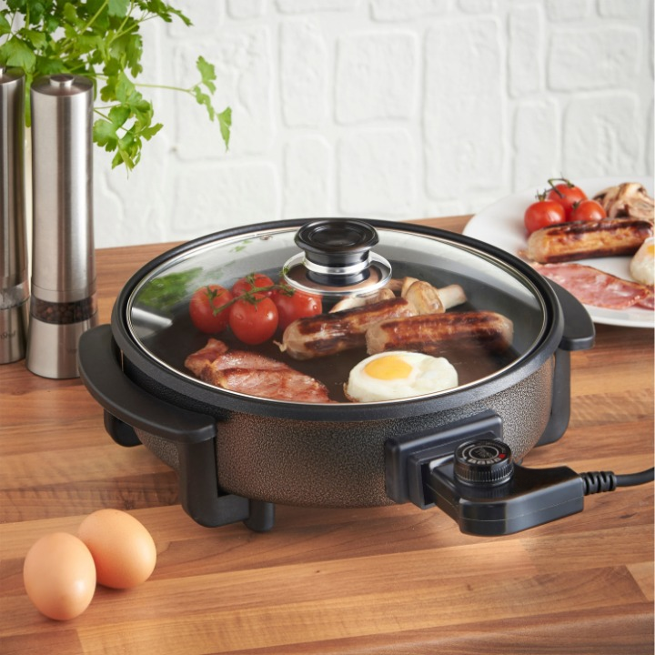Cuisinière électrique polyvalente avec couvercle transparent